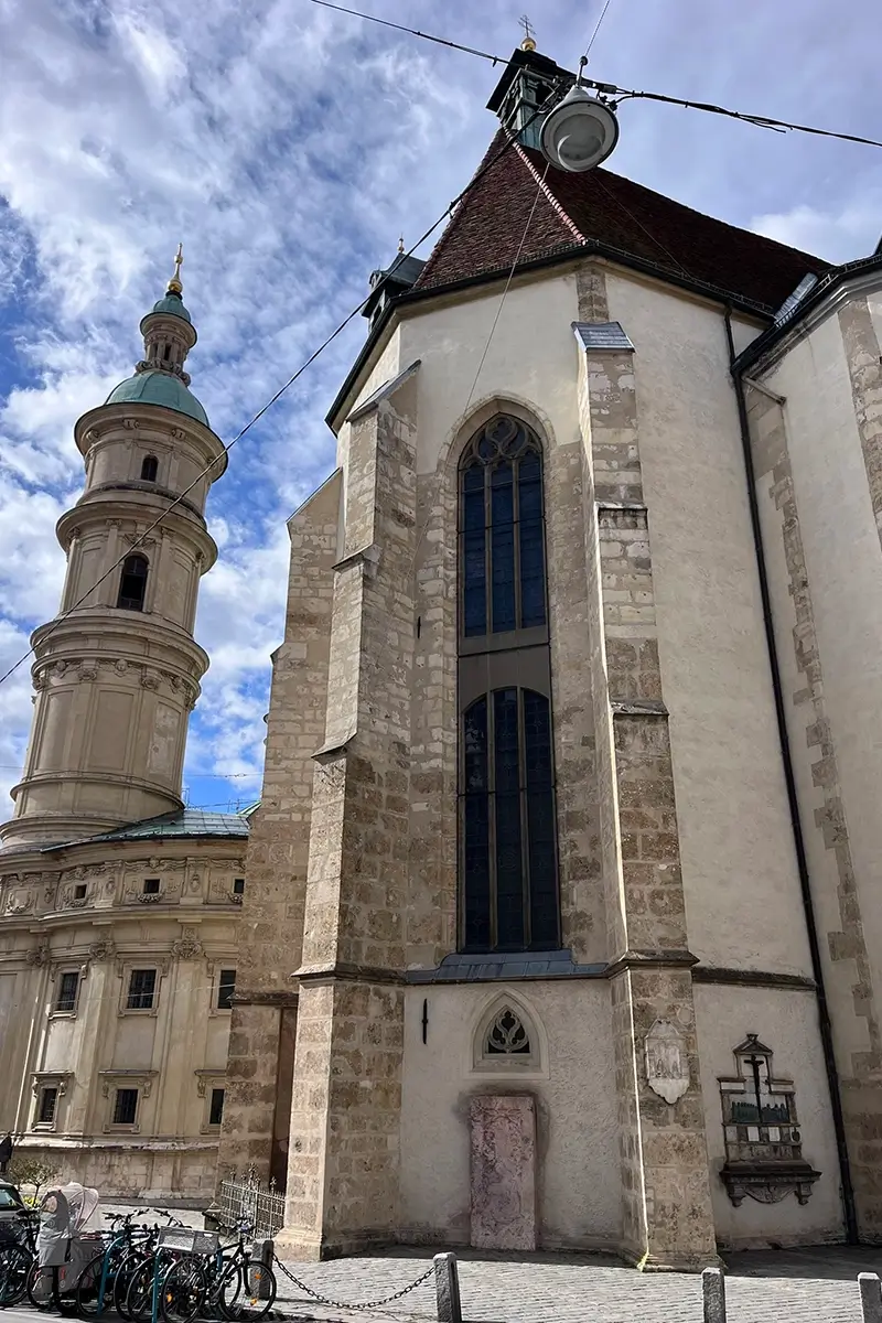 View of Graz Cathedral on Burgasse with the Mausoleum and tower visible, highlighting things to do in Graz
