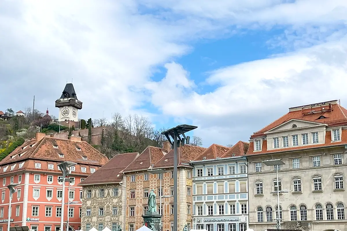 View of colorful buildings along Herrengasse from Graz Hauptplatz, highlighting things to do in Graz