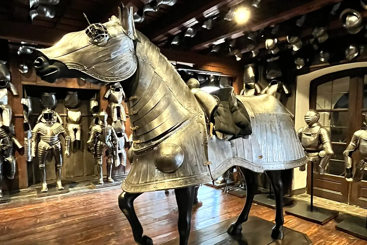 Historic horse armor displayed inside the Styrian Armoury in Graz, highlighting things to do in Graz