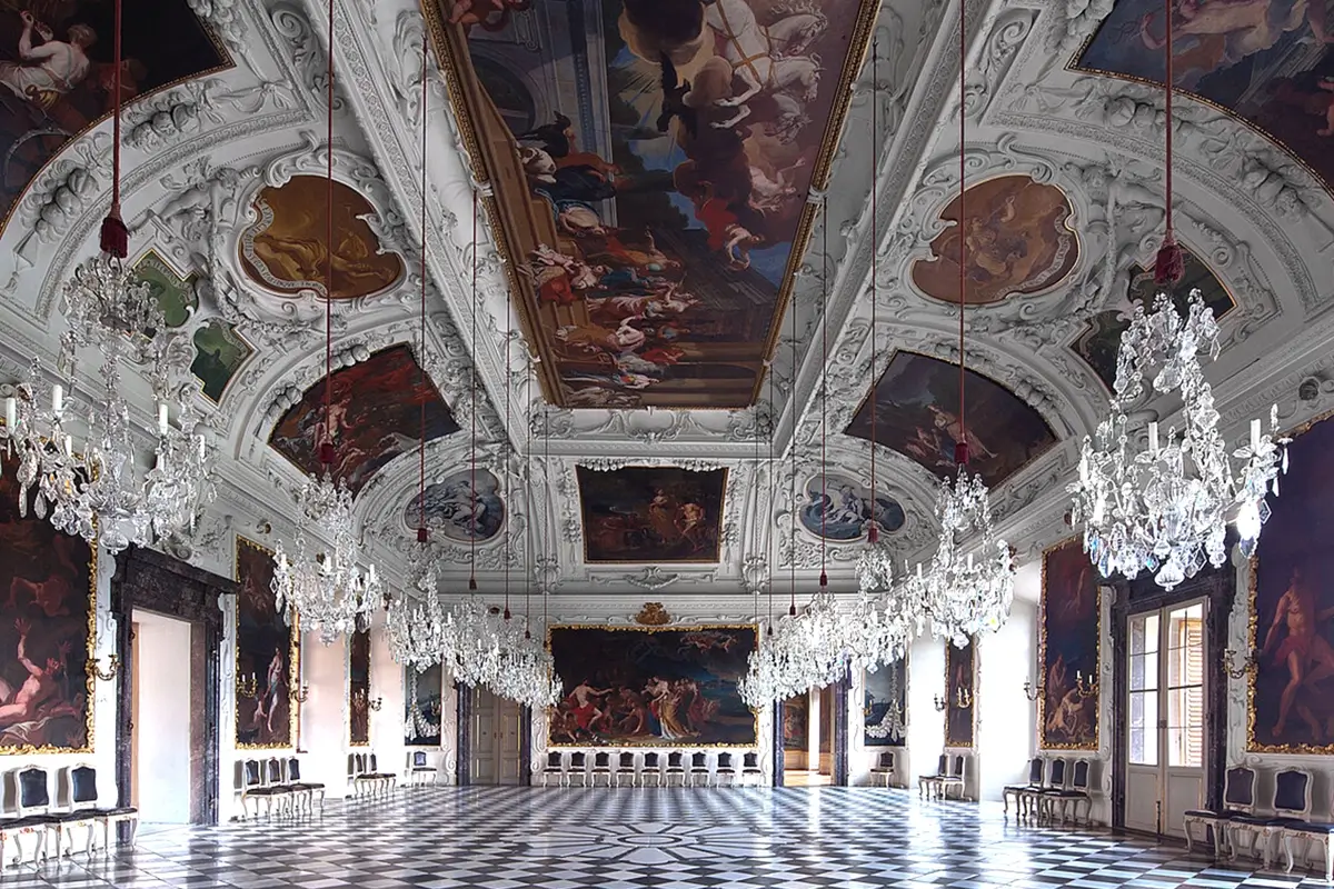 Planetary Room interior at Schloss Eggenberg with ornate ceiling artwork and historic museum details